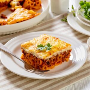 Greek,Pastitsio,Of,Pasta,,Ground,Lamb,,Grated,Cheese,,And,Tomatoes